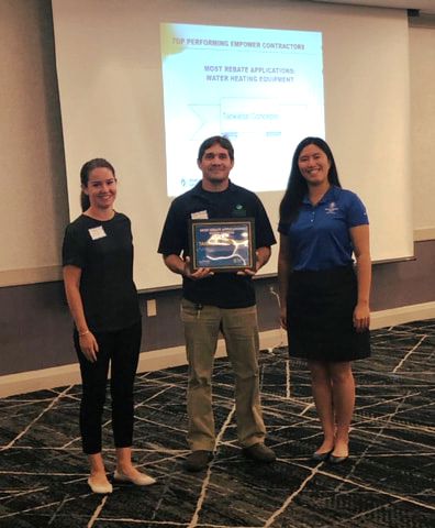 Rod Young accepts Tankless Concepts Rebate Award from Washington Gas - Sep 2019